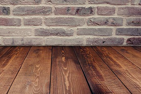 Solid hardwood flooring in a rustic American home